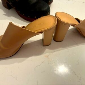 Beautiful Vince slip on sandals. Great for an event to elevate the legs. Used